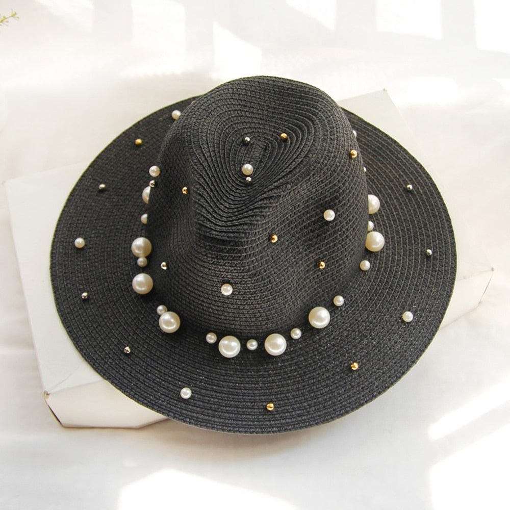 Elegant sun hat with pearl embellishments