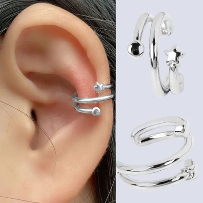 Spiral ear cuff with shiny surface