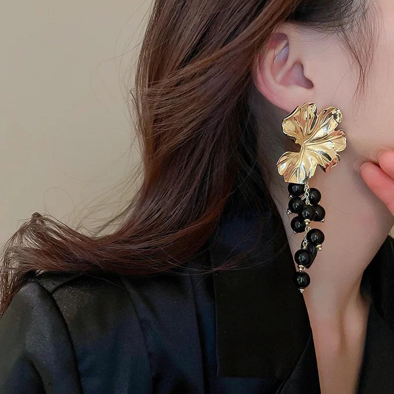 Elegant floral statement earrings with pearl cascade