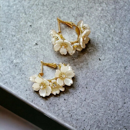 Flower hoop earrings with crystal centres