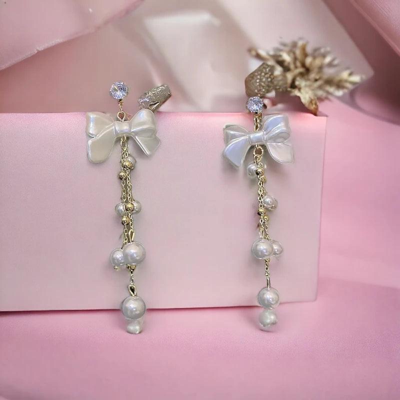 Charming loop earrings with pearl pendant